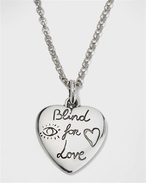 gucci blind for love pendant.